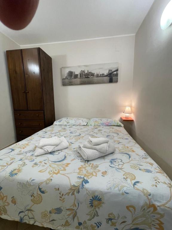 A bed or beds in a room at Normanni Central House