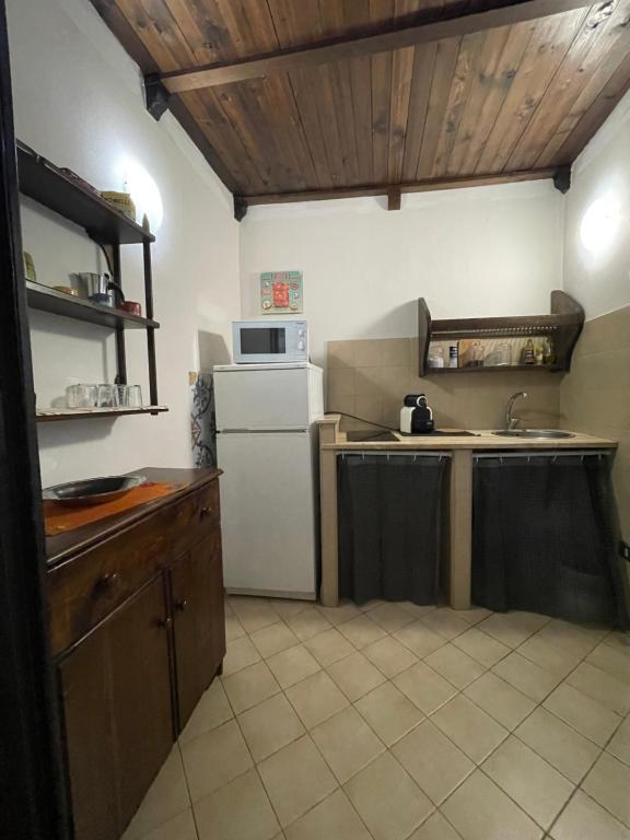 A kitchen or kitchenette at Normanni Central House