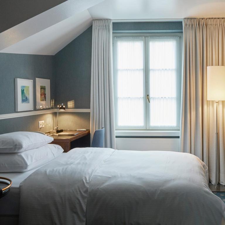Postel nebo postele na pokoji v ubytování Hotel Kindli