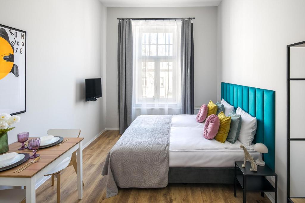 Posteľ alebo postele v izbe v ubytovaní Horizon Park Aparthotel