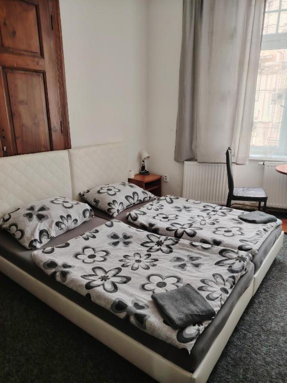 Postel nebo postele na pokoji v ubytování Centrum Ostrava - rooms