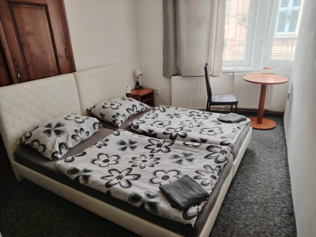 Postel nebo postele na pokoji v ubytování Centrum Ostrava - rooms