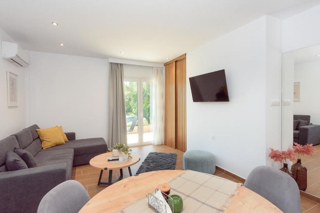 TV a/nebo společenská místnost v ubytování ANGELINA'S FAMILY apartment