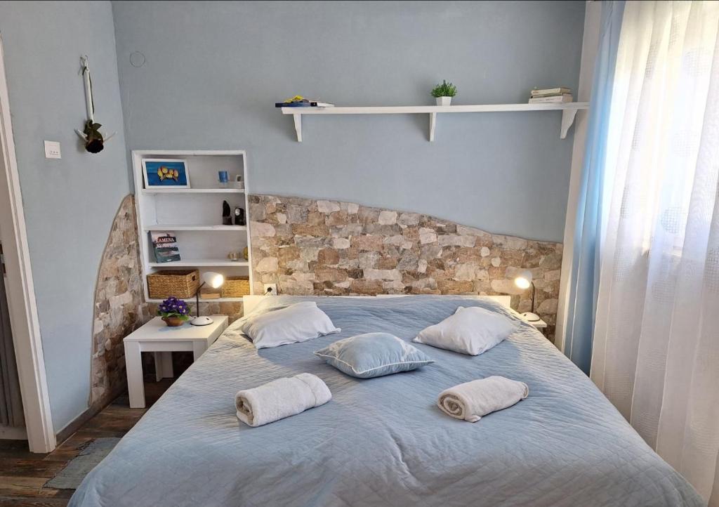 Postel nebo postele na pokoji v ubytování Apartman studio Otium
