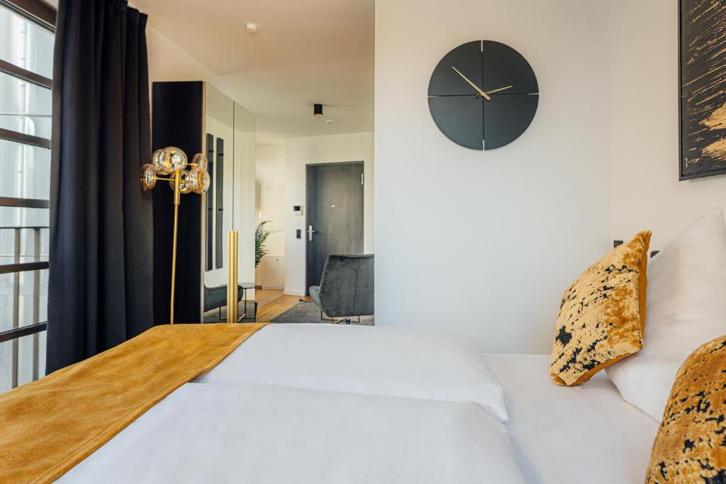 Postel nebo postele na pokoji v ubytování Urban Heaven Aparthotel