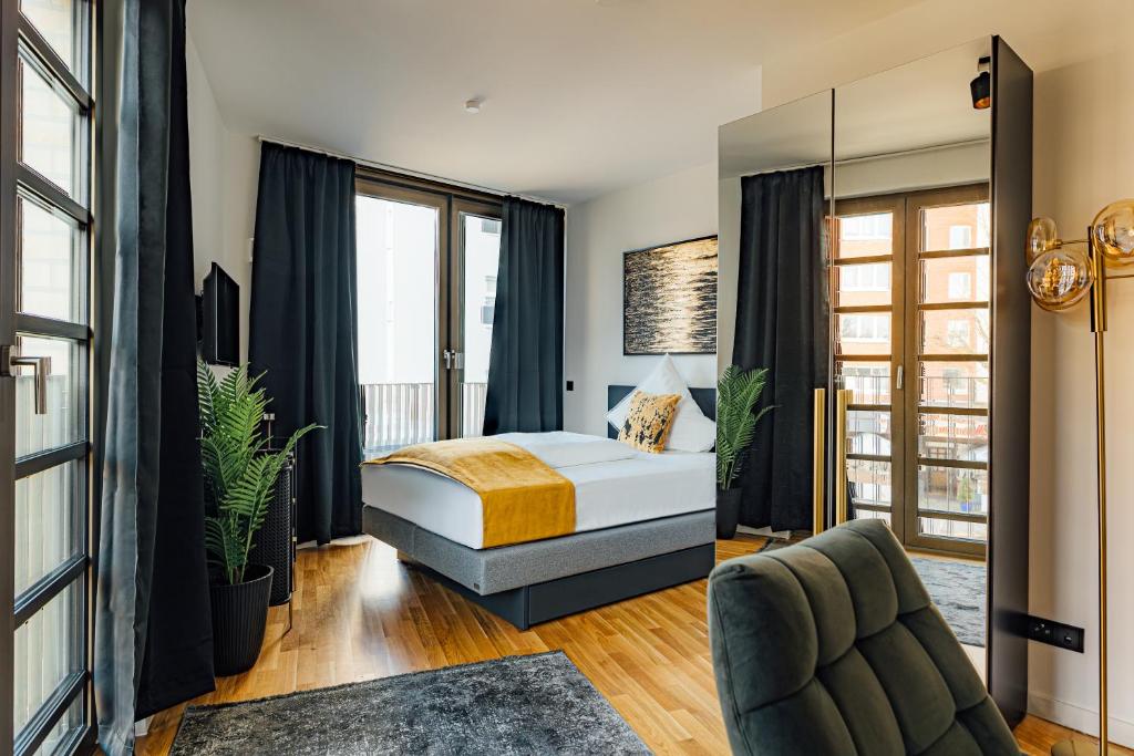 Postel nebo postele na pokoji v ubytování Urban Heaven Aparthotel