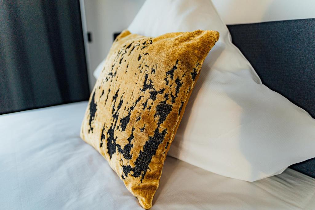 Postel nebo postele na pokoji v ubytování Urban Heaven Aparthotel
