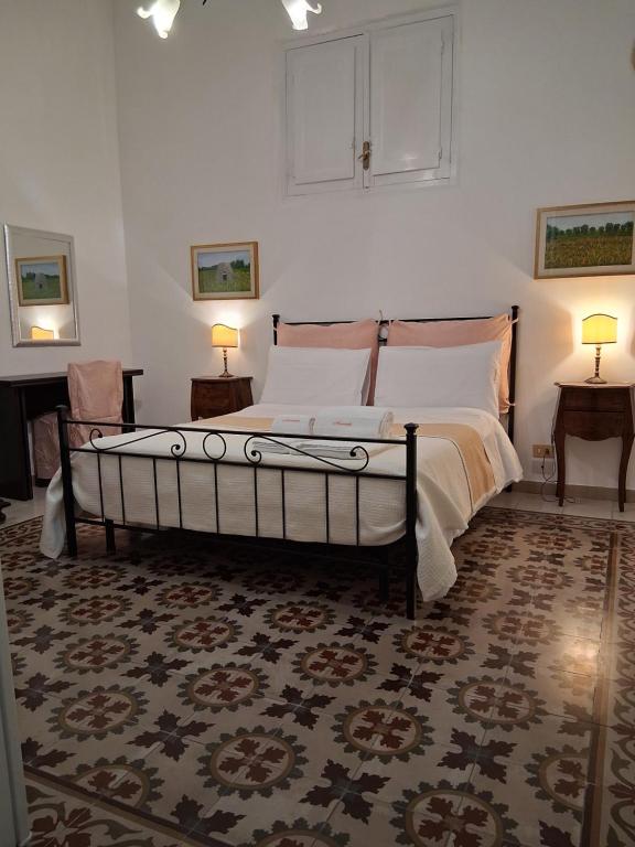 Postel nebo postele na pokoji v ubytování BnB '900 Lecce centro