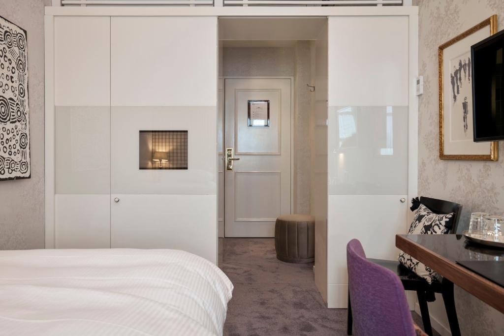 Postel nebo postele na pokoji v ubytování Hotel Kindli