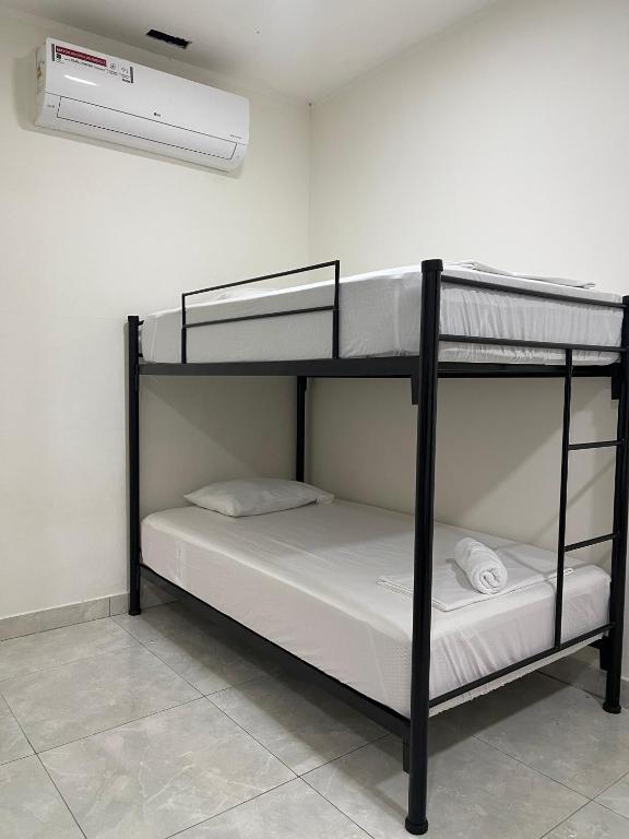 Postel nebo postele na pokoji v ubytování Iquitos House