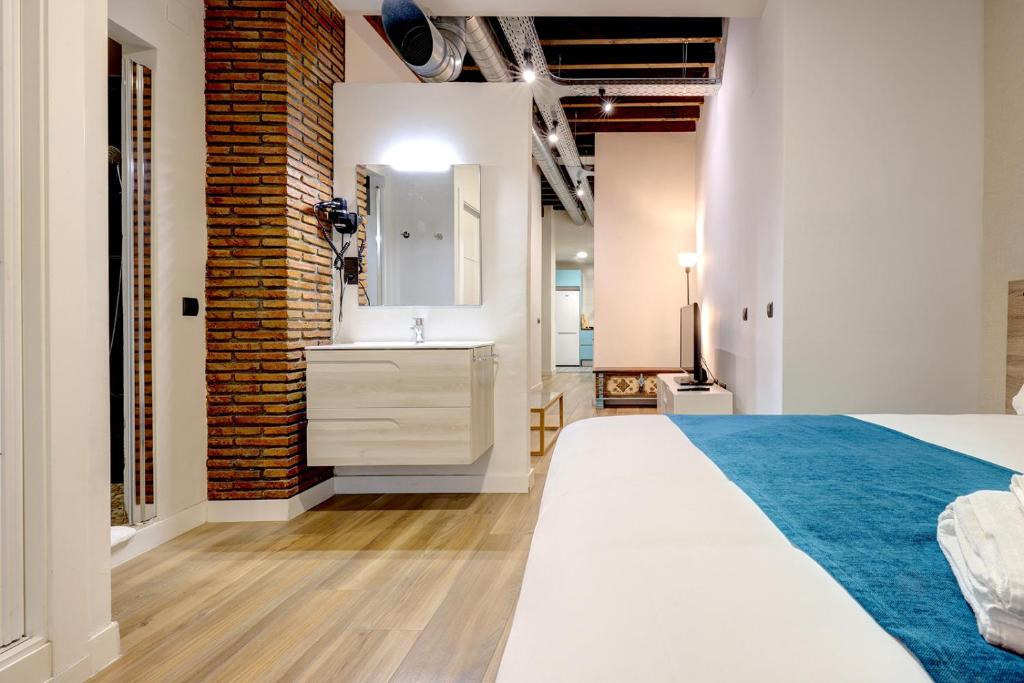 Posteľ alebo postele v izbe v ubytovaní Aqua Apartments Málaga
