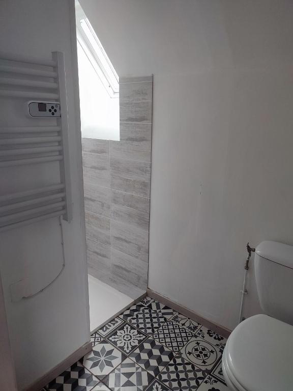 Koupelna v ubytování Gîte Bienvenue chez Naty