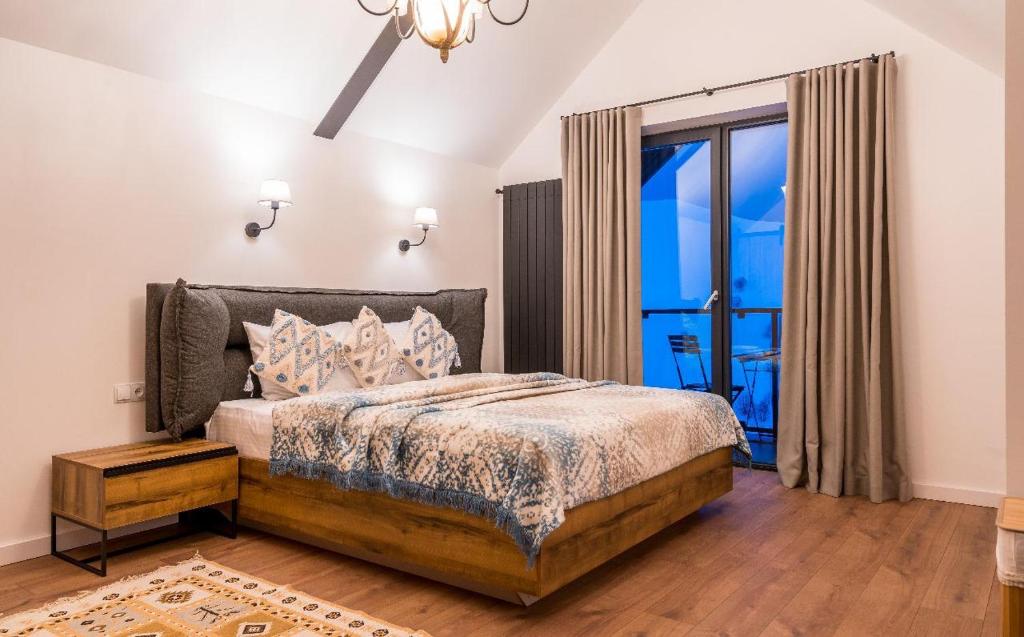 Postel nebo postele na pokoji v ubytování New Gudauri Four season