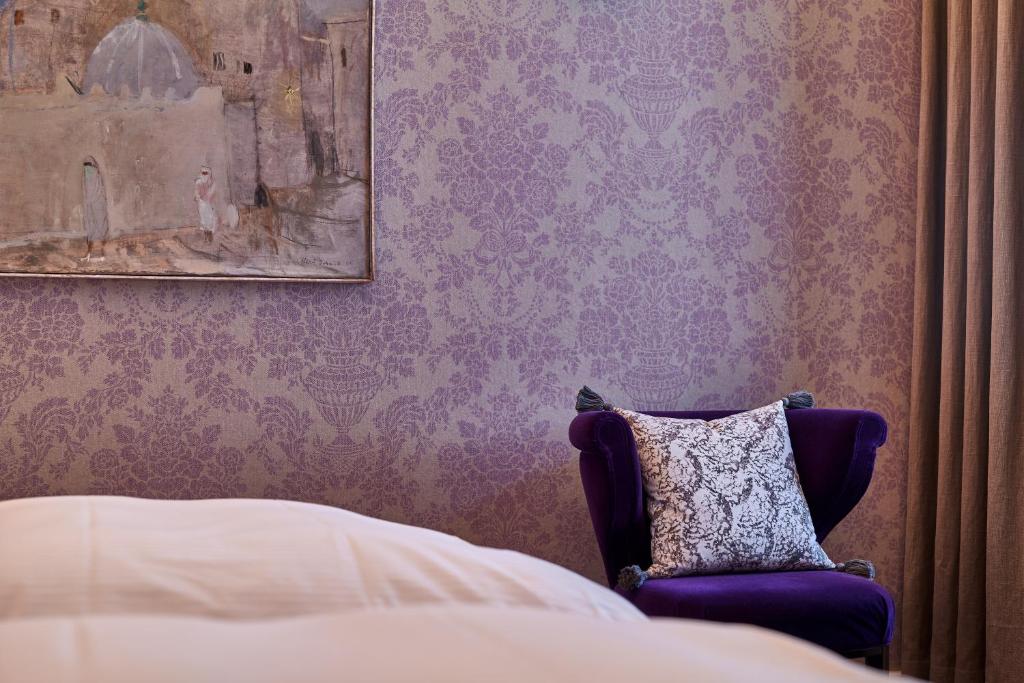 Postel nebo postele na pokoji v ubytování Hotel Kindli