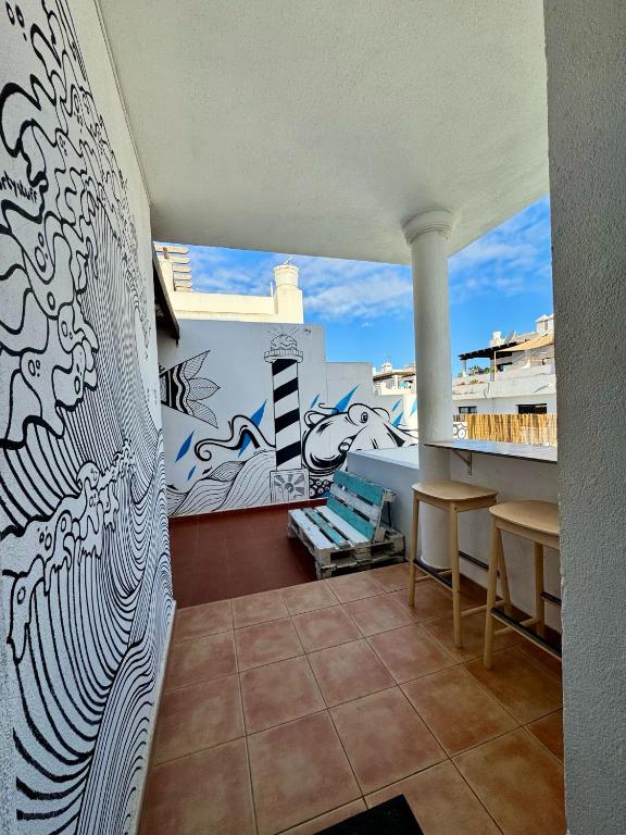 Balkón nebo terasa v ubytování La Fresa Hostel