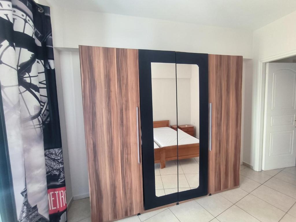 Postel nebo postele na pokoji v ubytování Eris Studios