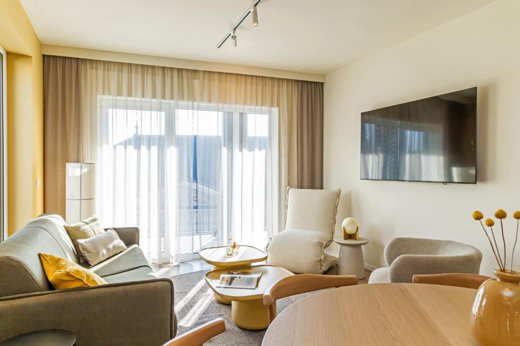 TV a/nebo společenská místnost v ubytování Marone Suites Budapest