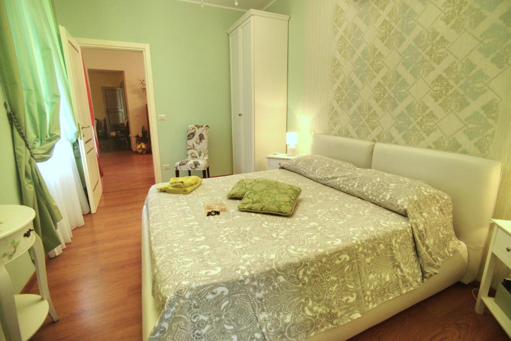 Łóżko lub łóżka w pokoju w obiekcie Luxury B&B '700