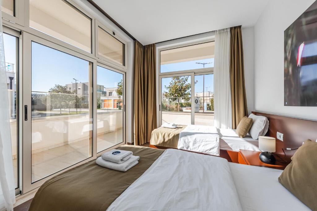 Postel nebo postele na pokoji v ubytování Apart Hotel Perla Resort Lalez Durres
