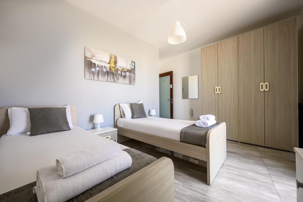Postel nebo postele na pokoji v ubytování F11 Room 3, private Room two single beds shared bathroom in shared Flat