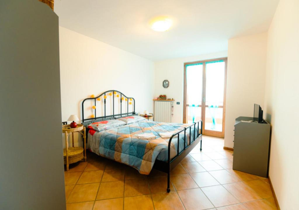 En eller flere senge i et værelse på Rifugio Panoramico in the Mountains Le Arcate