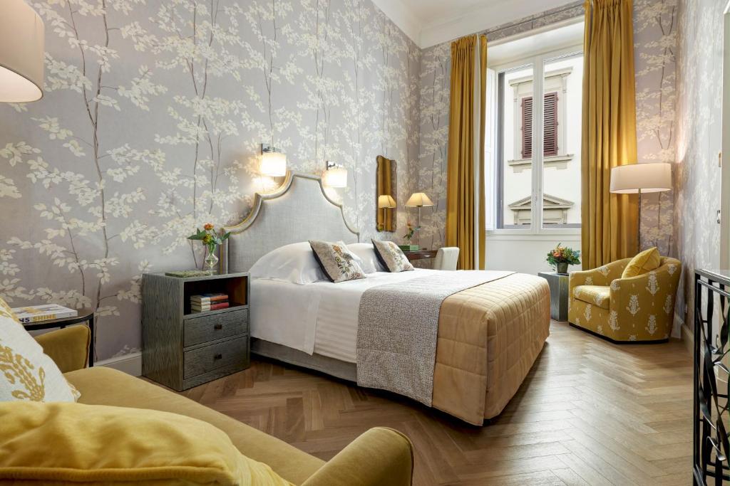 Postel nebo postele na pokoji v ubytování Rocco Forte Hotel Savoy