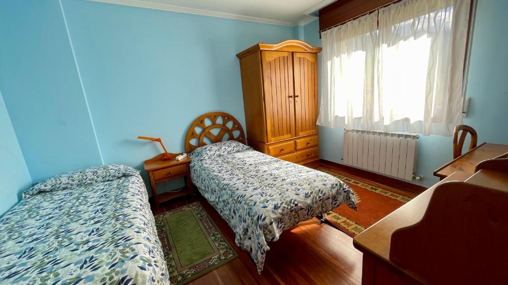 Posteľ alebo postele v izbe v ubytovaní VACACIONES VILLASANA