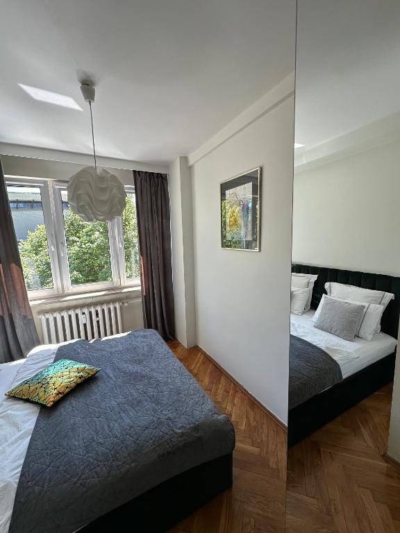 Posteľ alebo postele v izbe v ubytovaní Cosy apartment with amazing view
