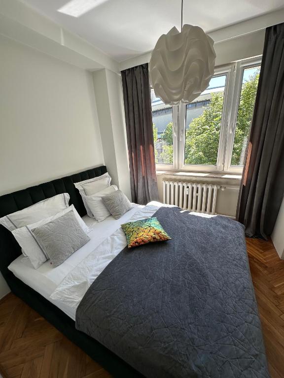 Posteľ alebo postele v izbe v ubytovaní Cosy apartment with amazing view