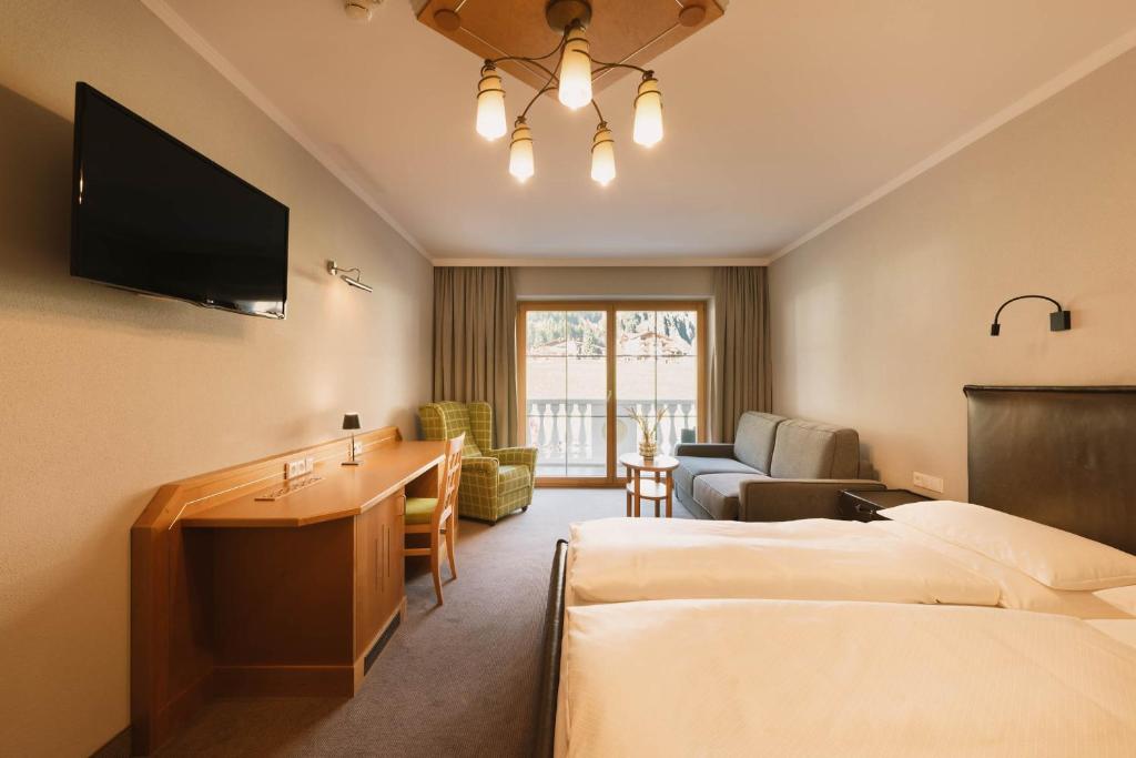 Postel nebo postele na pokoji v ubytování Familotel Kindl