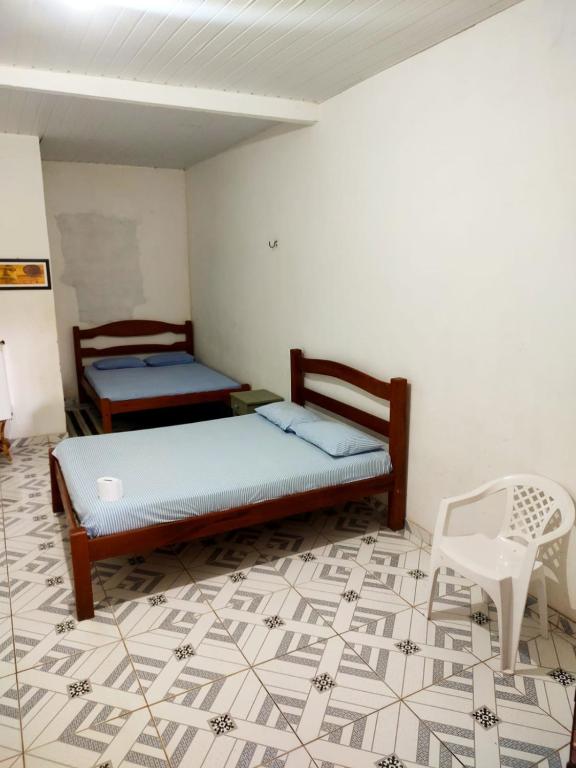 Postel nebo postele na pokoji v ubytování Pousada Lua e Mar