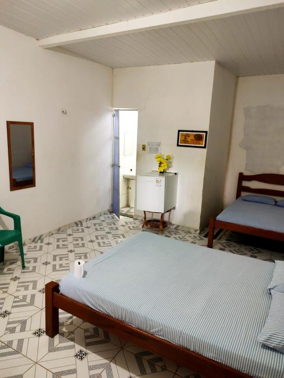 Postel nebo postele na pokoji v ubytování Pousada Lua e Mar