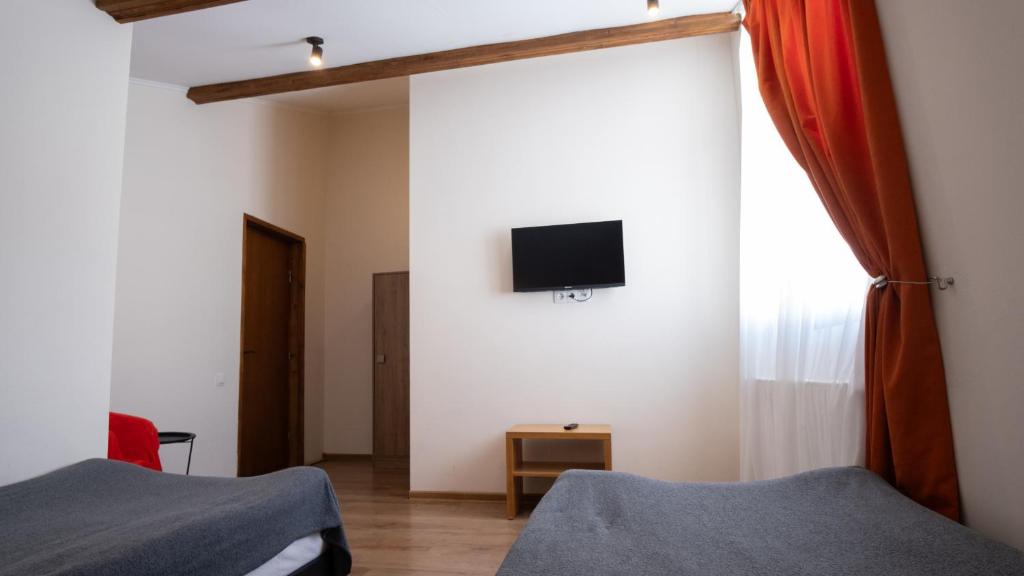 Postel nebo postele na pokoji v ubytování Chalet In Gudauri