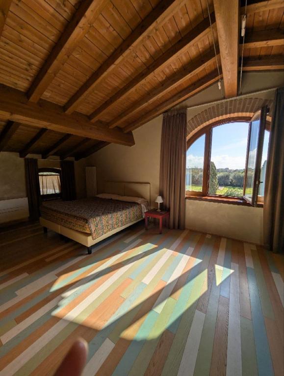 Postel nebo postele na pokoji v ubytování Casale Elisa Country Hotel