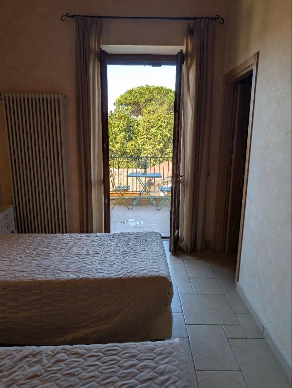 Postel nebo postele na pokoji v ubytování Casale Elisa Country Hotel