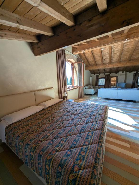 Postel nebo postele na pokoji v ubytování Casale Elisa Country Hotel