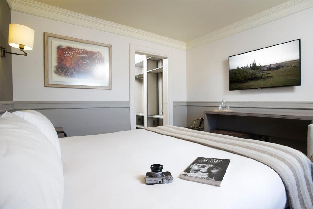 Postel nebo postele na pokoji v ubytování Hotel Costaustralis