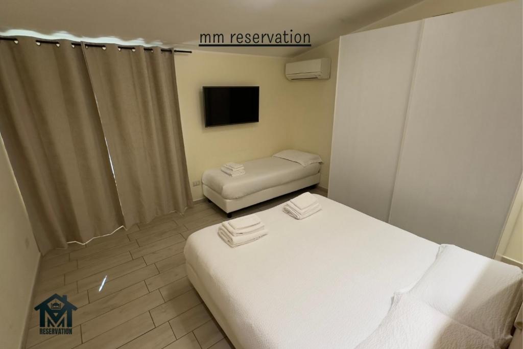 Posteľ alebo postele v izbe v ubytovaní Le Ghiande Guest House