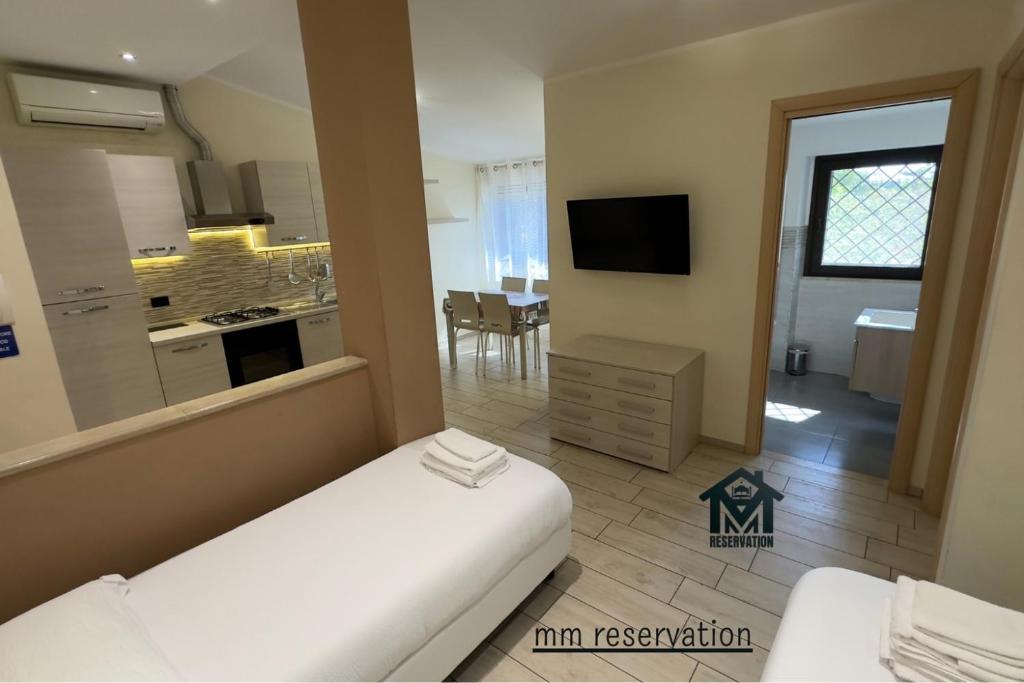 Posteľ alebo postele v izbe v ubytovaní Le Ghiande Guest House