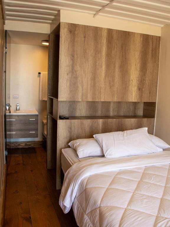 Postel nebo postele na pokoji v ubytování Nomada Republic Hotel Punta Chame