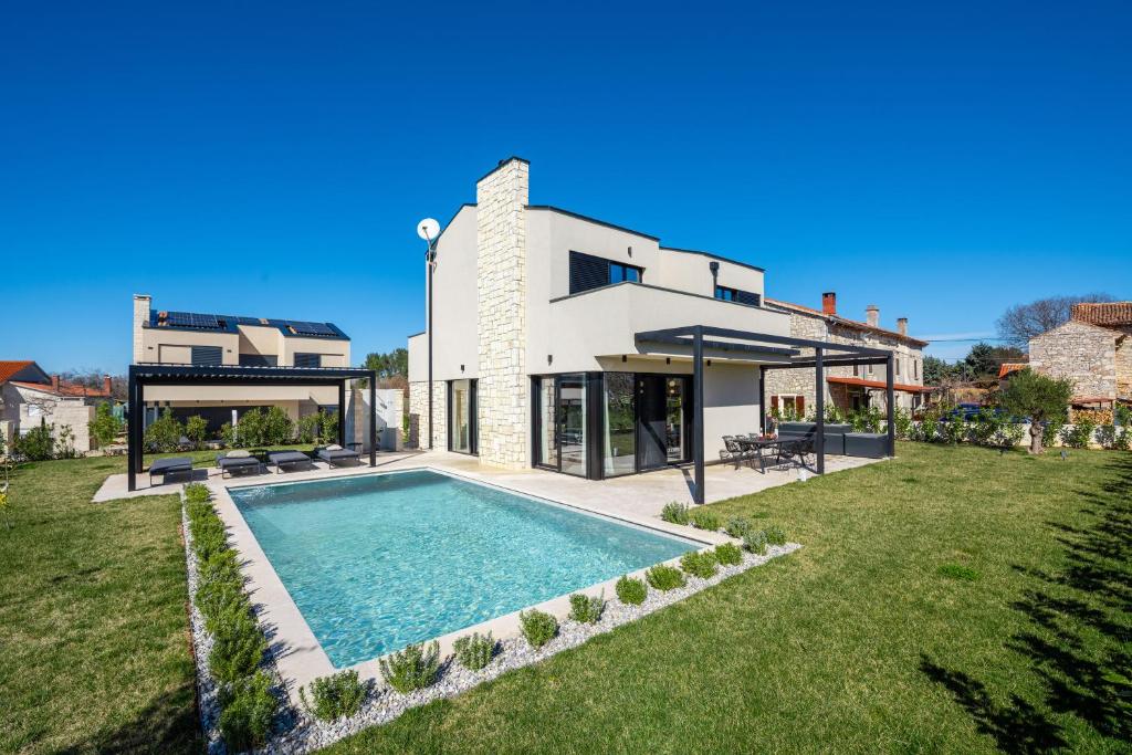 Swimmingpoolen hos eller tæt på Villa Maria