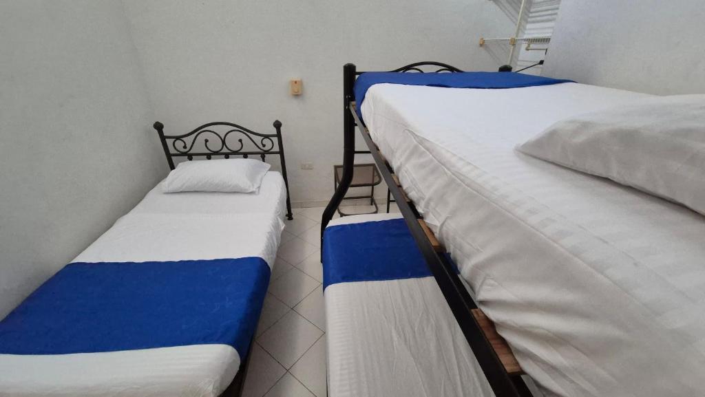 Postel nebo postele na pokoji v ubytování Casa Dante