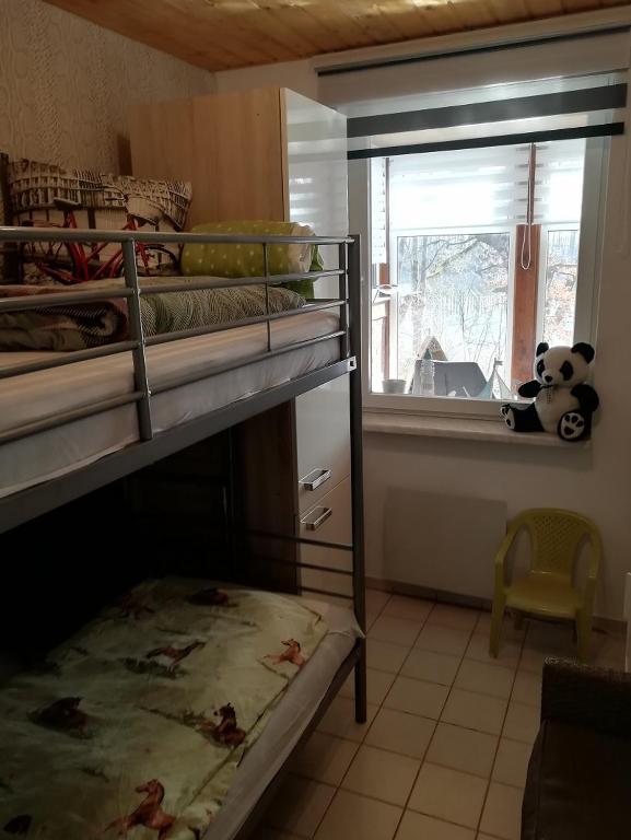 Postel nebo postele na pokoji v ubytování Schwandt-ein Bungalow mit Wasserblick, Ruderboot auf Anfrage