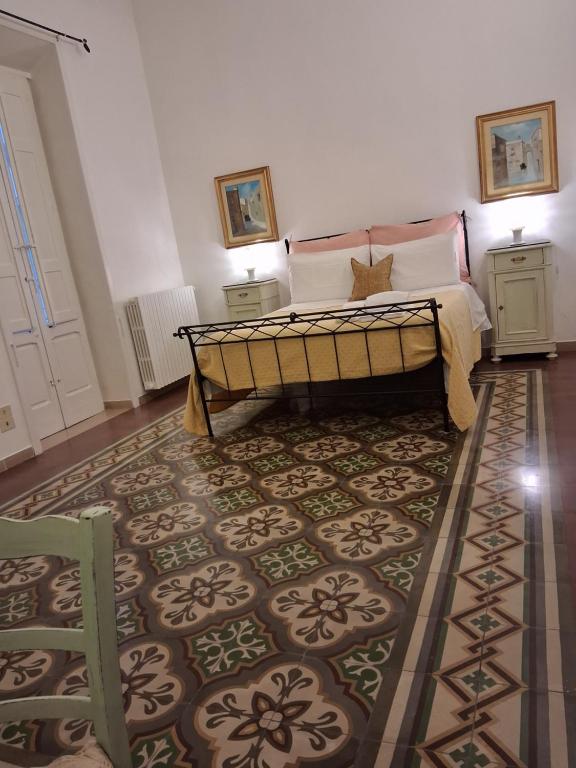 Postel nebo postele na pokoji v ubytování BnB '900 Lecce centro