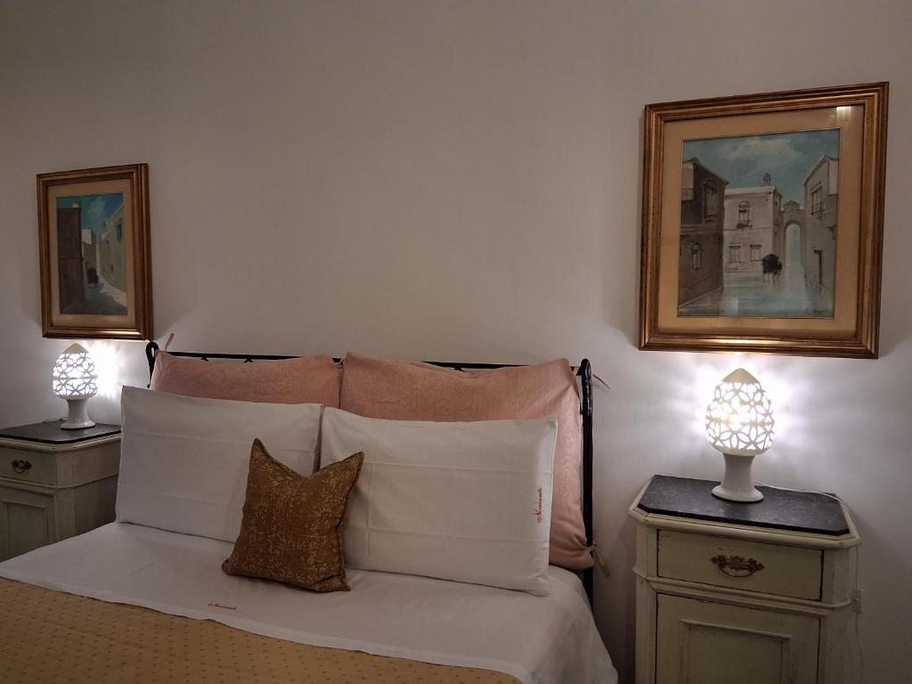 Postel nebo postele na pokoji v ubytování BnB '900 Lecce centro