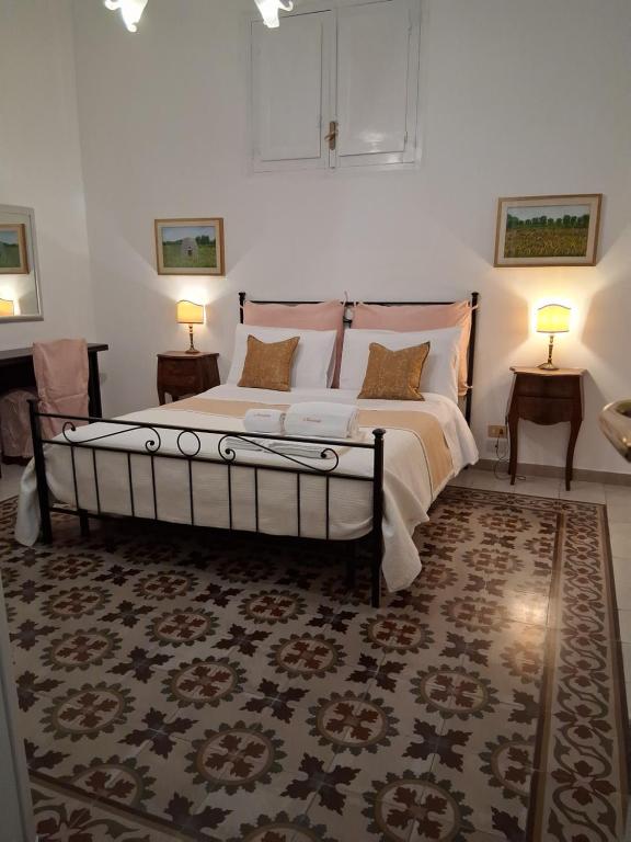 Postel nebo postele na pokoji v ubytování BnB '900 Lecce centro