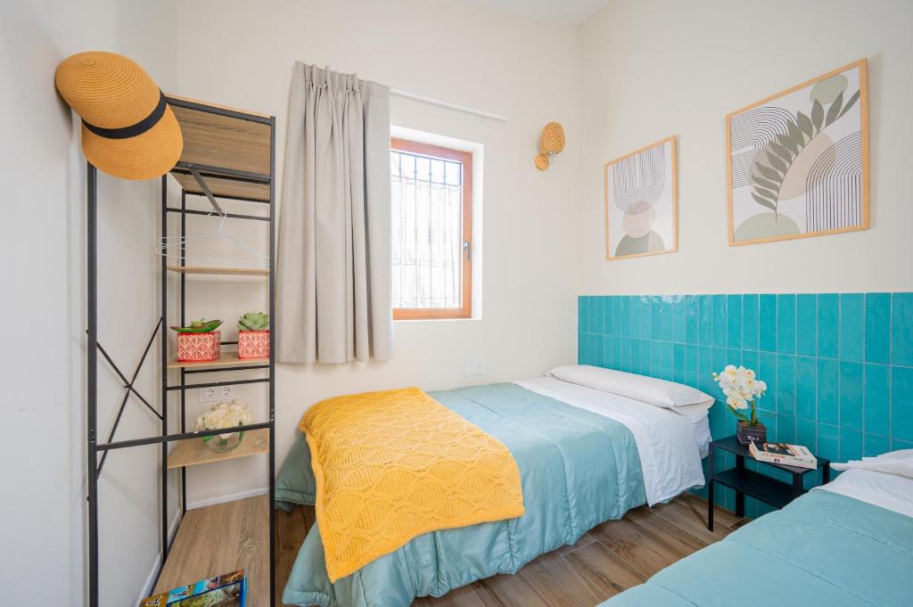 Postel nebo postele na pokoji v ubytování The Nest Masia Can Tiranasi Relájate y Disfruta Escapada con Encanto Cerca de Barcelona-