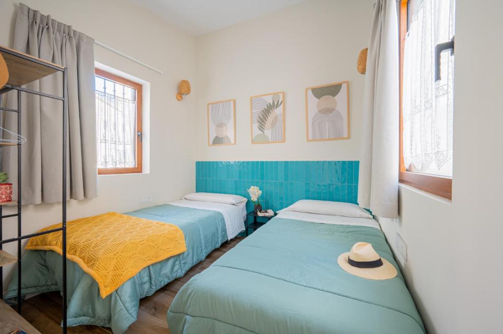 Postel nebo postele na pokoji v ubytování The Nest Masia Can Tiranasi Relájate y Disfruta Escapada con Encanto Cerca de Barcelona-