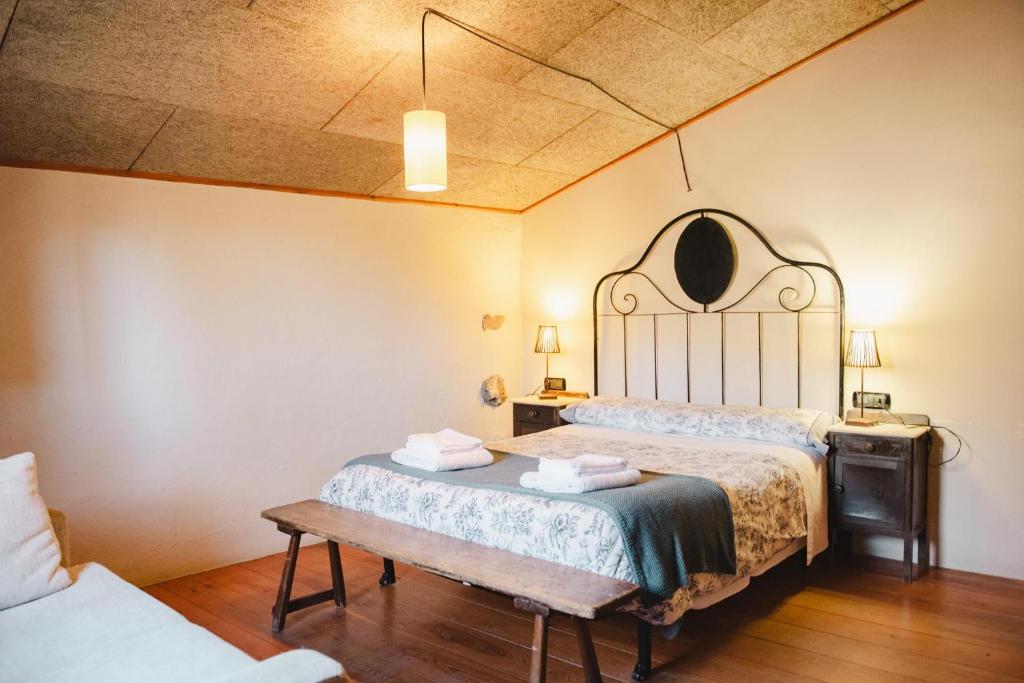 Postel nebo postele na pokoji v ubytování Cal Pai