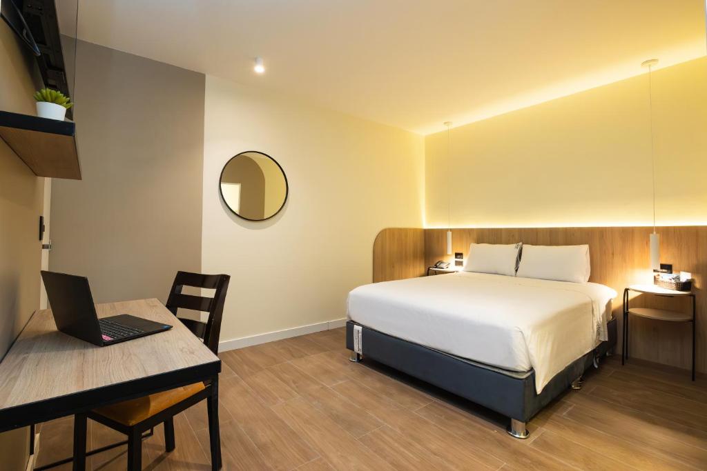 Voodi või voodid majutusasutuse Hotel Solec Piura toas